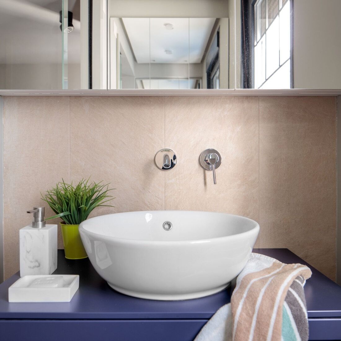 Lavabo de baño reformado en piso de 100m