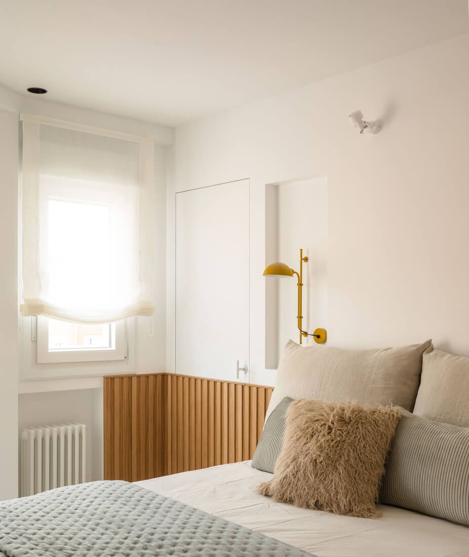 Cojines decorativos dormitorio reformado en Deusto